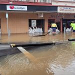 Brethren charity RRT help with sandbagging floods in Queensland